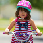 Young Girl on Bike